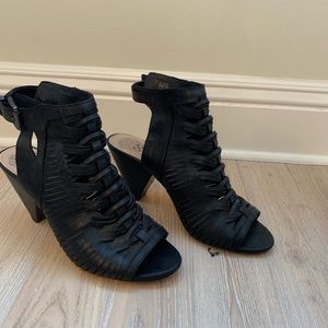 Vince Camuto open toe woven sandals.